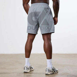 Pantalones cortos deportivos de playa informales de verano para hombre, pantalones cortos deportivos holgados con logotipo personalizado y patrón sólido a buen precio - Product Image 3