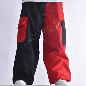 Pantalon cargo baggy imperméable bicolore rouge et noir avec grandes poches, taille ajustable et chevilles élastiques - Product Image 1