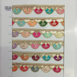 Tela de encaje bordado floral colorido vibrante y detallado con patrones intrincados, perfecto para la moda de alta gama - Product Image 1