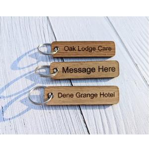 Porte-clés en bois durable avec anneau en métal léger et facile à transporter au quotidien, disponible dans des tailles personnalisées. - Product Image 1