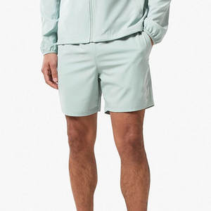 ชุดเซ็ตเสื้อแจ็คเก็ตกันลมและกางเกงขาสั้นผู้ชายสีพื้นสำหรับฤดูหนาว ผ้าฝ้าย 100% รับสกรีนโลโก้ เป็นมิตรกับสิ่งแวดล้อม ระบายอากาศได้ดี - Product Image 4