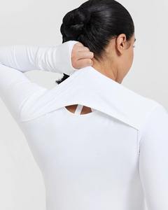 Vente en gros Vêtements de sport d'entraînement à manches longues Design confortable Veste de yoga de couleur unie avec fermeture éclair avec poche Vestes d'entraînement pour femmes - Product Image 5