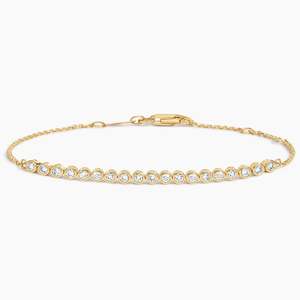AURALUXURIA Pulsera de tenis de moda para mujer con diamantes de laboratorio de bisel pequeño de 1/3 de cobertura (1/4 ct.) Tw. Estilo Delicado en Oro Amarillo de 14K - Product Image 1