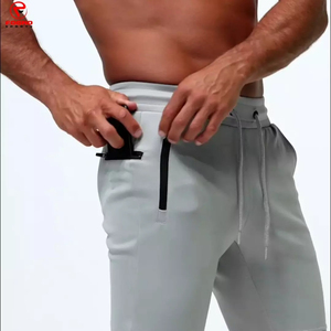 Pantalones de chándal cónicos deportivos baratos para hombre con panel de color personalizado pantalones de chándal grises ajustados tarifa al por mayor precio barato OEM - Product Image 6