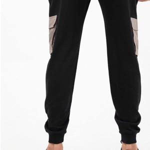 กางเกงจ็อกเกอร์ผู้ชายคุณภาพสูง - เนื้อผ้านุ่ม ทนทาน เป็นมิตรกับสิ่งแวดล้อม ระบายอากาศได้ดี เหมาะสำหรับการวิ่ง ออกกำลังกาย และกิจกรรมประจำวัน - Product Image 2