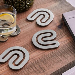 Juego de Posavasos Minimalistas de Aluminio Pulido con Bordes Ultra Suaves para Mesas Modernas, Venta al por Mayor - Product Image 1