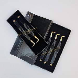 Pestañas Antiestáticas GETUP BROSONS IMPEX de Acero Inoxidable, Color Negro Liso con Punta Dorada y Diseño de Corona Recortada, 10 mm - Product Image 1