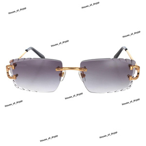 Lunettes de soleil de luxe sans monture avec accents dorés et verres dégradés – Élégance moderne et stylée - Product Image 2