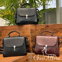 Vente en gros de nouveautés Mini sac à bandoulière en cuir pleine fleur de créateur de luxe pour les sacs à main en cuir de vache à la mode pour femmes
