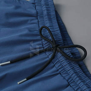 Pantalon décontracté pour hommes à la mode avec taille à cordon et texture lisse pour des tenues décontractées confortables - Product Image 4