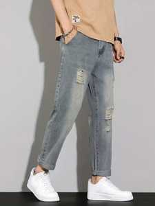 Pantalones vaqueros rasgados de moda para hombre, pantalones vaqueros informales de ajuste holgado, atuendo cómodo para el día a día para ropa de calle, viajes de verano y moda de fiesta - Product Image 3