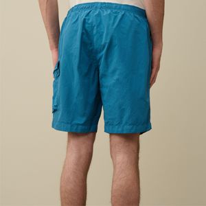 Pantalones cortos de baño cargo de hombre de moda personalizados OEM con bolsillos-perfectos para nadar y ropa casual - Product Image 4