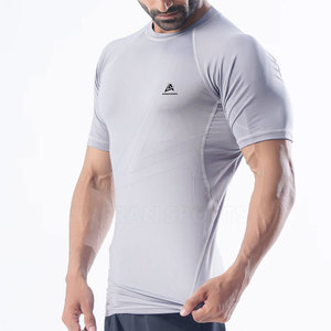 2023 últimas camisetas de gimnasio para hombres patrón sólido transpirable de secado rápido Body Fit camiseta para Fitness - Product Image 2