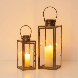 Rustic farmhouse metal lantern with durable iron frame and clear glass panels for seasonal holiday home decor - Product Image 1