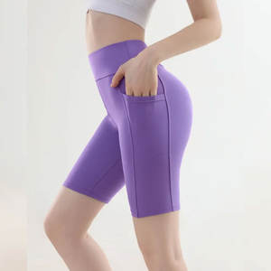 Pantalones cortos de yoga para mujer de nuevo estilo, transpirables, teñidos lisos para ropa informal con bolsillo lateral, hechos de fábrica a precios baratos - Product Image 1
