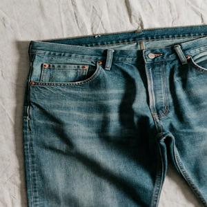 Jeans en denim brut pour hommes et femmes |   Vêtements d'hiver streetwear haut de gamme OEM ODM en gros, 100% coton lavé, poids moyen, logo personnalisé - Product Image 1