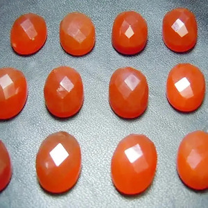 Irrégulier 8x10mm naturel rouge Onyx Rose coupe ovale dos plat Cabochon pierre précieuse du fournisseur indien au coût d'usine en gros - Product Image 2