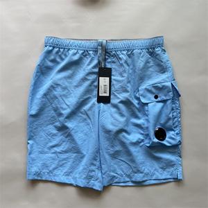 Shorts de sport tendance pour hommes, en spandex/polyester, à séchage rapide, unis, décontractés, pour l'été, pour la plage, avec cordon de serrage - Product Image 5