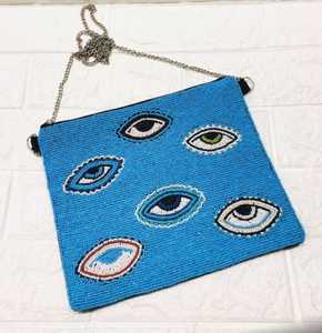 Meilleure pochette bohème d'inspiration côtière avec des glands colorés et des coquillages naturels, accessoire élégant pour les mariages et les célébrations - Product Image 6