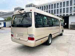 Minibús Usado de Segunda Mano con Motor Diésel de 4 Cilindros, 36 Asientos, Autobús Coaster para Transporte Urbano, Listo para Conducir - Product Image 3