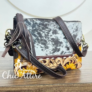 Vente en gros directe d'usine de pochette en cuir de vachette véritable usiné à la main et sac à bandoulière pour femmes pochette à pompon sac à main - Product Image 1