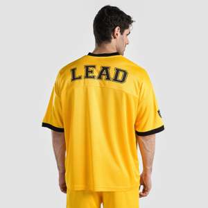 Ensemble de sport en polyester respirant jaune, taille XL Plus, comprenant un haut à manches courtes et un short imprimé, léger et uni. - Product Image 3