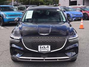 Genesis GV70 2.5T AWD 2024 Noir Intégral d'occasion, Toit ouvrant gauche, Démarrage à distance, Sièges en cuir, Pack Premium, Boîte automatique, Jantes en alliage - Product Image 2