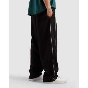 Pantalones Deportivos Unisex Tech Leisure, Corte Relajado, Color Negro, Transpirables, 100% Poliéster con Detalle de Ribete Distintivo - Product Image 2