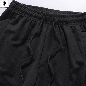 ชุดวอร์มเล่นกีฬาแบบลำลองของผู้ชายชุดวิ่งจ๊อกกิ้งทำจากผ้าขนสัตว์ชุดฝึกเอวยางยืดแบบแบนตกแต่งลายด้านหน้าราคาถูก - Product Image 6