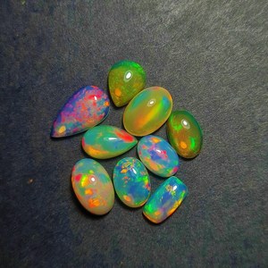 หินโอปอลแบบหลายไฟโอปอลทรงหลังเบี้ยทำจากโอปอลแท้หลายขนาดให้เลือกไซส์ใหญ่ - Product Image 1