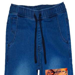 กางเกงยีนส์จ็อกเกอร์ผู้ชายราคาส่ง ปี 2025 คุณภาพสูง ทรงเข้ารูป น้ำหนักเบา สวมใส่สบาย ระบายอากาศได้ดี แห้งเร็ว กระดุมผ่าหน้า - Product Image 4