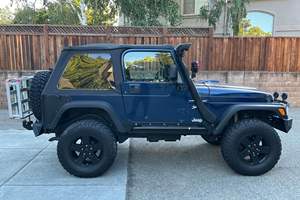 JEEP WRANGLER SPORT 4X4 2001 D'OCCASION CÔTÉ GAUCHE/CÔTÉ DROIT - Product Image 3