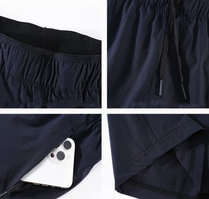 Pantalones cortos informales sólidos con bolsillo con cremallera invisible para hombre, pantalones cortos de nailon con logotipo personalizado, pantalones cortos deportivos ligeros para uso diario - Product Image 2