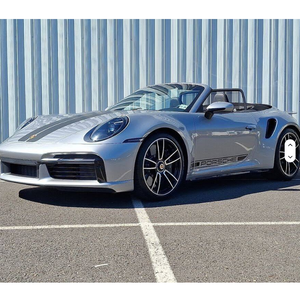 Porsche 911 Turbo S Cabriolet AWD 2024 Argent Métallisé GT, Transmission Automatique, Jantes Alliage d'Occasion R17 Gauche, Sièges en Cuir, Pack Équipement Électrique - Product Image 1