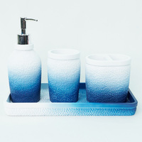 Ensemble d'accessoires de salle de bain en résine comprenant un distributeur de savon Boîte à mouchoirs Porte-brosse à dents Ensemble de toilette stocké pour un usage domestique