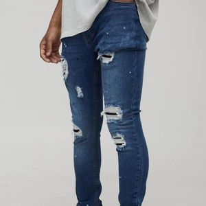 กางเกงยีนส์ทรงสลิมฟิตแฟชั่นปี 2025 กางเกงยีนส์ผู้ชายทรงสกินนี่แบบขาดๆ สไตล์ฮิปฮอป กางเกงสตรีทแวร์ ผลิตในปากีสถาน บริการ OEM - Product Image 1