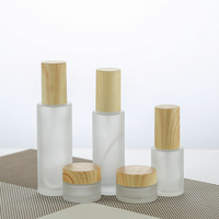 Vente en gros de flacons pulvérisateurs en verre givré de 30 ml, 50 ml, 100 ml avec bouchon imitation bois, réutilisables, pour lotion, parfum