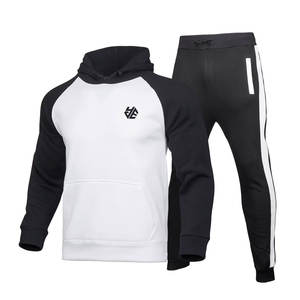 Venta al por mayor de los hombres de calidad premium 100% algodón Jogging conjuntos ligero transpirable invierno Fitness ropa patrón sólido chándales - Product Image 1