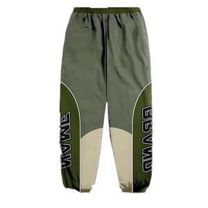 Conjuntos de chaqueta y pantalón con cremallera para hombre, chándal de nailon y poliéster con retazos de bloque de color personalizado al por mayor - Product Image 6