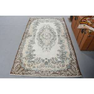 Tapis turc 3,9x6,8 pieds, tapis vintage, tapis marron à bordures bleues - Product Image 1