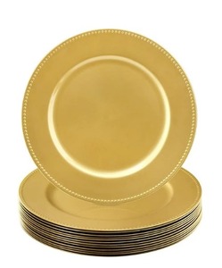 แท่นชาร์จสีทองทำจากสเตนเลสสตีลเป็นสัญลักษณ์ของความหรูหราและความซับซ้อน - Product Image 1