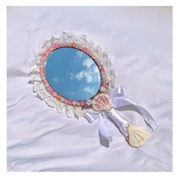 Miroir à main en coquillage naturel Accessoire de coquille unique fait à la main pour la décoration intérieure de la plage de la vanité et les idées de cadeaux Miroir de maquillage Vietnam