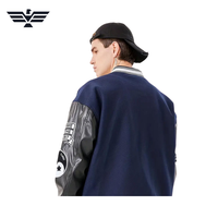 Blouson universitaire bleu marine pour homme avec manches en PU, patchs brodés, coupe-vent style urbain, doublure en laine chauffante, col montant, coupe classique