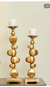 Les bougeoirs de luxe en métal d'or ont empilé des supports décoratifs de pilier de forme de caillou - Product Image 5