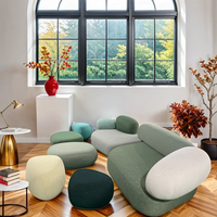 Canapé modulable en tissu en forme de L, style galets, pour salon minimaliste ou salle d'attente