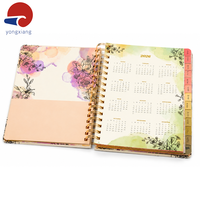 Carnet de planification spirale haut de gamme avec pages dorées, couverture rigide, onglets, autocollants et pochette intégrée