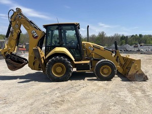 Chargeuse-pelleteuse Cat 430 avec godet avant et bras de terrassement arrière, équipement de construction jaune - Product Image 4