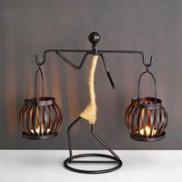 Lanterne porte-bougie en fer durable faite à la main pour la décoration de Noël et de Pâques, prix de gros directement de l'usine