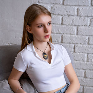 Colgante ovalado pulido de Shungita con serigrafía Ojo de Horus opción 1 1.3*2 pulgadas (34*50 mm) - Product Image 4