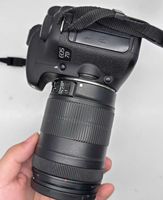 Appareil photo reflex numérique Canon EOS 7D d'occasion avec objectif 18-135mm, excellent état, système de vidéoconférence, zoom optique 20x, Full HD, matériau ABS, pour vote.